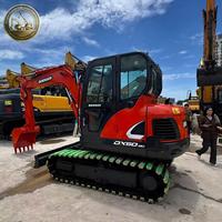 Excavatrice Doosan DX60-9C d'occasion 6T avec chenilles en caoutchouc, moteur d'origine, mini-excavatrice pour l'aménagement paysager et les travaux municipaux
