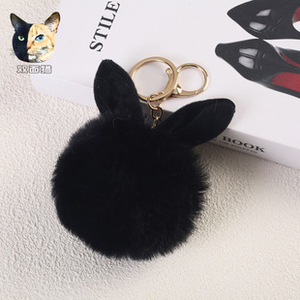 Vente en gros d'arcs-en-ciel en PU pour l'amour boule de fourrure pompon porte-clés coeur de pêche léopard pendentif de couple accessoire de voiture en peluche - Product Image 5