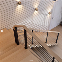 Escalier flottant préfabriqué sur mesure à poutre simple avec balustrade à câbles métalliques