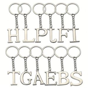Venta al por mayor de fábrica, se pueden personalizar 26 letras inglesas, accesorios que no se desvanecen, colgante de llavero hueco de acero inoxidable - Product Image 2