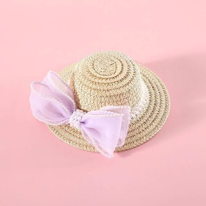Hermoso sombrero de paja para niños con lazo de perlas, accesorio unisex para exteriores - Product Image 1