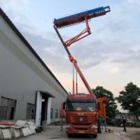 Élévateur de construction sur chenilles télécommandé 380V pour carreaux de toiture, équipement à grande portée, hauteur de levage 35m, moteur et boîte de vitesses 8T