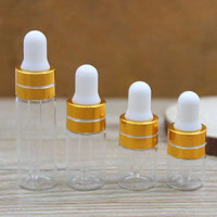 Mini flacon compte-gouttes en verre transparent ambré avec bouchon doré pour huiles essentielles, parfums et cosmétiques liquides