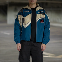 Veste bomber en toile streetwear avec broderie personnalisée, patchwork, appliques, logo, collage, style universitaire et de course