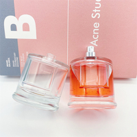 Bouteilles de parfum en verre vides transparentes rondes de 100ml avec couvercle magnétique blanc noir