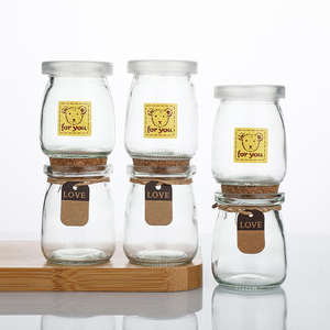 Venta al por Mayor de Mini Frascos de Vidrio de 100 ml Resistentes a Altas Temperaturas para Mousse, Yogur, Miel, Mermelada y Pudín, con Tapa de Plástico o Corcho - Product Image 1