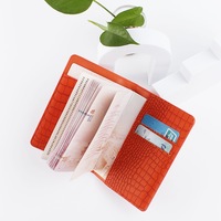 Porte-passeports familial en cuir de crocodile, vente en gros, couleurs personnalisées, multifonctionnel, organiseur de passeports