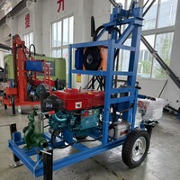 Foreuse de puits montée sur remorque 150M 200M, machine de forage de puits profonds avec trépan en carbure pour la construction de puits profonds