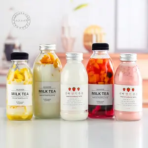 Özelleştirmek ucuz toptan fiyat 300ML 500ML yuvarlak şekilli süt çay suyu Pet şişe su şişesi tek kullanımlık plastik şişe