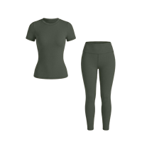Ensemble de sport côtelé 2 pièces pour femme : T-shirt à manches courtes col rond et Legging taille haute effet push-up, sans coutures, anti-transparence pour les squats, idéal pour le yoga. Commande en gros.