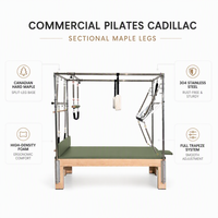 Table trapèze Cadillac en bois d'érable vert sauge, avec pieds modulaires fendus et plateau plat antidérapant, pour salles de bien-être naturel