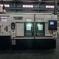 Centre de tournage à double broche parallèle TT15 léger et efficace avec commande CNC FANUC 3 axes et porte-outils 12 stations pour le traitement de gros volumes