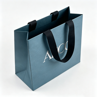 Sacs cadeaux en papier de luxe écologiques, recyclables, imperméables, avec ruban et logo personnalisé pour les petites entreprises de vêtements et de chaussures de style européen