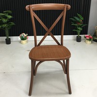 Chaise à dossier croisé en métal couleur grain de bois pour événements et mariages, en promotion