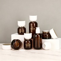 Nouvel ensemble de packaging haut de gamme marron pour cosmétiques et soins de la peau, flacon en verre de 100 ml pour lotion/sérum, pot pour crème/pommade, faux cils