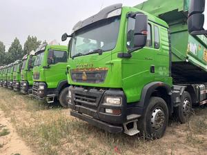 Camión Volquete Usado SI-NOT-RUK H-OW-O TX 8x4, Camión Volquete de 4 Ejes y 400HP para Transporte de Lodo, Arena y Materiales de Construcción Pesados - Product Image 1