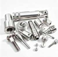 Pièces d'assemblage CNC pour l'usinage de connecteurs de pinces de serrage en acier inoxydable et de têtes de pulvérisation réglables pour le perçage et le brochage