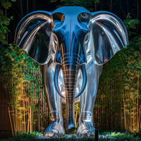 Statue de tête d'éléphant personnalisée en acier inoxydable avec relief en métal poli avec un style Feng Shui pour installation artistique