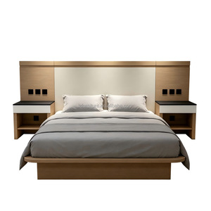 Fournisseur de meubles sur mesure OEM, ensemble de chambre à coucher pour hôtel 3 étoiles avec lit plateforme en MDF, tête de lit intégrée, tables de chevet assorties - Product Image 1