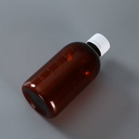 30ml 50ml 60ml 100ml 120ml 250ml Bouteille de sirop contre la toux maigre en PET vide bouteille de liquide de médecine ambre clair avec tasse à mesurer