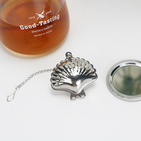 Infuseur à thé en acier inoxydable au design moderne Offre Spéciale Forme de coquille de haute qualité avec chaîne 5.2cm de diamètre Logo personnalisé Service à café et thé