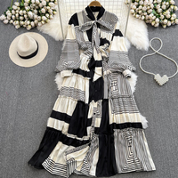 Robe décontractée trapèze imprimée personnalisée à lacets cintrage à la taille mi-longue à manches longues élégante grande lanterne de décoration avec nœud oscillant