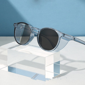 Gafas de bloqueo de luz azul polarizadas a prueba de viento fotocromáticas antivaho marco redondo completo de pierna TR90 - Product Image 1