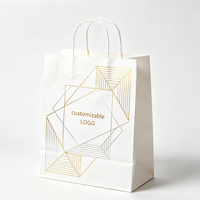 Sac fourre-tout élégant en kraft blanc épais avec estampage à chaud personnalisé pour magasin de vêtements, sacs cadeaux pour marques de créations artisanales