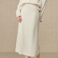 Jupe en laine unie pour femme avec décoration perlée, taille élastique et style minimaliste tendance.