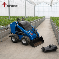 Chargeuse compacte 4x4 EURO 5 EPA CE 35 CV avec moteur diesel, roues pneumatiques, godet grappin, godet à fumier et souffleuse à neige, capacité 700 kg - 850 kg