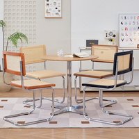 Chaises de salle à manger en métal minimalistes et solides avec dossier en rotin, style nordique rétro, pour appartements et salons – Vente en gros Haofa