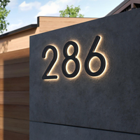 Enseignes d'adresse 3D flottantes en métal noir mat rétroéclairées personnalisées pour bâtiments, avec effet halo LED chaud, étanches IP65 pour entreprises