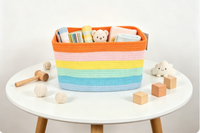 Panier de rangement rectangulaire pliable en corde de coton tressée à rayures arc-en-ciel, écologique, avec poignées, pour jouets d'enfants, vêtements, chambre d'enfant, salon
