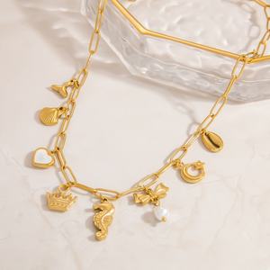 Colgante de dijes de acero inoxidable chapado en oro con diseño de margaritas, corazones, mariposas, estrellas de mar y hojas, cruz de rosa para la fabricación de joyas - Product Image 3