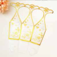 Boîte-cadeau de bonbon hexagonale imprimée d'or créative avec la conception mignonne de fleur Acétate clair PET vitrine pliante pour l'emballage
