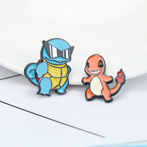 10 Designs Jeu Vidéo POKE Anime Pins Poche Monstre Personnage De Dessin Animé Feu Dragon Tortue Métal Émail Badge Pin - Product Image 1