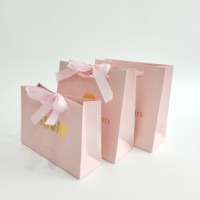 Sacs cadeaux de luxe en papier blanc écologiques personnalisés avec votre propre logo