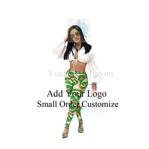 Ingrosso Abbigliamento Donna Autunno 2026: Leggings Fitness a Maniche Lunghe con Dettaglio Incrociato - Product Image 1