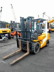 TCM <b>Used</b> USA Origin 3-25 Ton Diesel Forklift 4WD Solid Tire Rough Terrain Two/Three Stage Mast Manual Good Condition Low Hour - Product Image 2