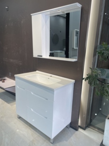 Simple white <b>freestanding</b> <b>bathroom</b> vanity with integrated sink and soft closing storage drawers - Product Image 3