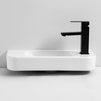 Chaozhou vente en gros toilette d'hôpital Malaisie coin de toilettes en céramique accroché au mur Mini lavabo de petite taille prix