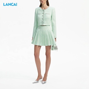 2025 femmes vêtements laine tissu veste et <span class=keywords><strong>jupe</strong></span> plissée en gros mode et élégant 2 pièces <span class=keywords><strong>Blazer</strong></span> costume pour les femmes - Product Image 3