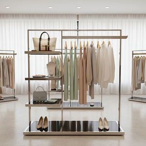 Moderno Exhibidor de Ropa de Acero Inoxidable con Estantes, Exhibidor de Pie Ajustable en Altura para Tiendas y Boutiques - Product Image 3