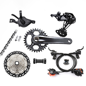 Grupo de Transmisión <span class=keywords><strong>SHIMANO</strong></span> <span class=keywords><strong>DEORE</strong></span> <span class=keywords><strong>XT</strong></span> M8100 de 12 Velocidades para Bicicleta de Montaña, Cassette 12s 10-51T MS, Desviador Trasero M8100, Frenos Ice, Piezas Originales - Product Image 1
