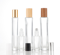 Flacon de parfum cylindrique en verre à fond épais de 5 ml, 10 ml, 15 ml, vide, en gros, directement de l'usine, en stock avec tête de pulvérisation