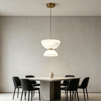 Lustre moderne de luxe en marbre, luminaire suspendu au plafond en acier au design tendance pour l'éclairage intérieur de la maison