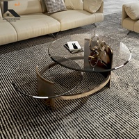 Nouvelle table basse moderne en verre rond avec structure en acier pour salon, vente en gros