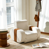 Fauteuil lounge confortable en mousse pour enfants, style nordique, en velours pelucheux avec bordure côtelée contrastante, silhouette arrondie