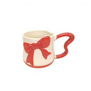 <span class=keywords><strong>Tasse</strong></span> en céramique Hengfei avec poignée nœud papillon mignonne, motif dessin animé blanc et rouge, design classique, origine Fujian, <span class=keywords><strong>tasse</strong></span> à café pour <span class=keywords><strong>femme</strong></span>, Saint-Valentin - Product Image 1