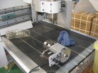 Mini routeur CNC en bois 3D 4 axes 6012 6090 petite machine de table pour les travailleurs à domicile facile à utiliser avec le système de contrôle DSP